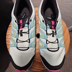 Soloman Women's trail running athletic Outdoor Sneakers in green and Pink.